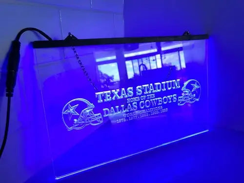Illuminated Dallas Cowboys sign on etched glass LED sign at Texas Stadium Champions