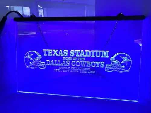 Illuminated Dallas Cowboys sign on etched glass LED sign at Texas Stadium Champions
