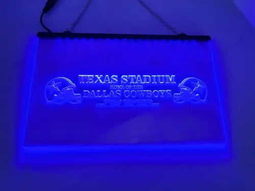 Illuminated Dallas Cowboys etched glass LED sign at Texas Stadium Champions display