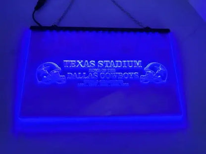 Illuminated Dallas Cowboys etched glass LED sign at Texas Stadium Champions display