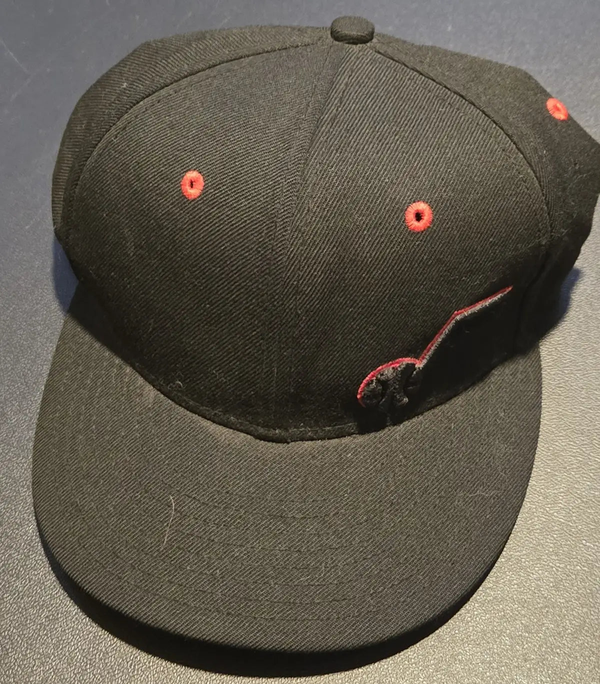 Black New Era 59FIFTY Utah Jazz fitted hat with red accents in VG condition