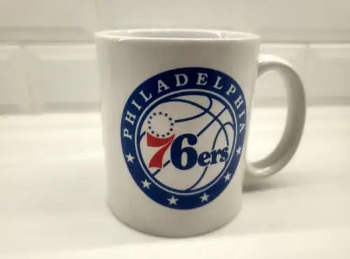 NBA Philadelphia 76ers ceramic coffee cup featuring team logo for fans