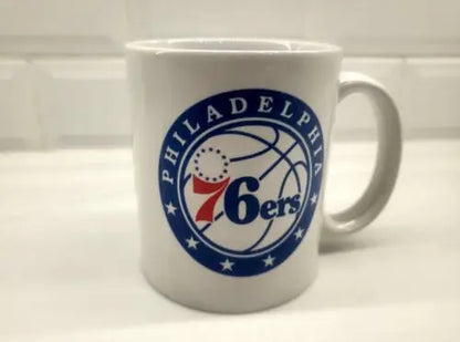 NBA Philadelphia 76ers ceramic coffee cup featuring team logo for fans