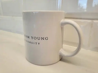 White ceramic Brigham Young University coffee mug for NCAA fans