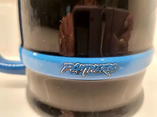Black 3D sculpted Carolina Panthers ceramic coffee mug with logo design