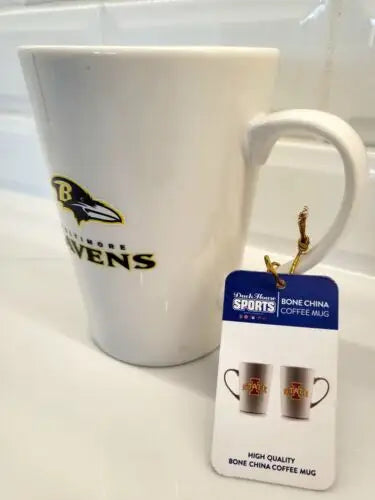 White bone china coffee mug featuring Baltimore Ravens logo by Duck House