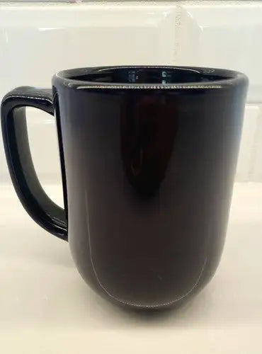 Glossy black Ceramic Coffee Mug featuring Tennessee Titans 3D logo relief design