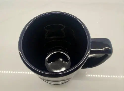 Dark blue ceramic coffee mug featuring Tennessee Titans 3D logo relief design