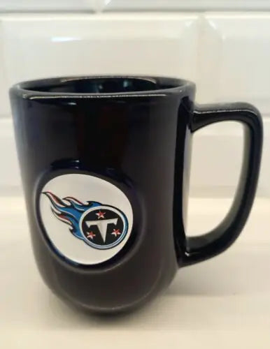 Dark blue Tennessee Titans relief ceramic coffee mug with 3D logo design