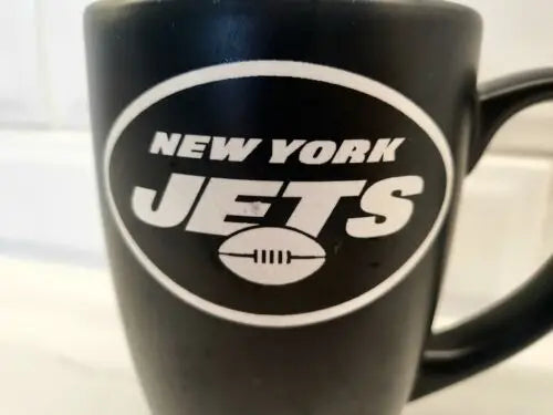 Black New York Jets ceramic coffee mug for fans, perfect for enjoying your favorite drink