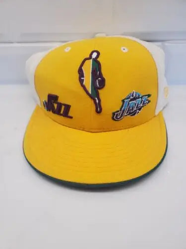 Yellow and white Utah Jazz baseball cap from the Orleans Jazz 1970s collection