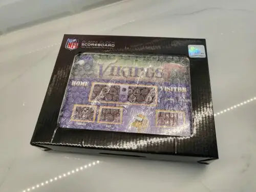 Boxed Minnesota Vikings alarm clock with LED scoreboard display and stand