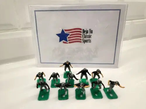 Miniature football player figurines of NFL 1970s Oakland LA Raiders in new black paint