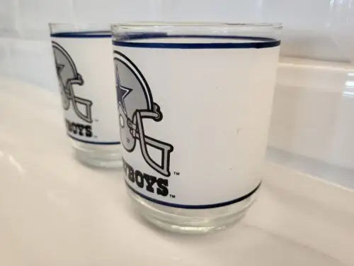 Two Dallas Cowboys frosted glass helmet logo drinking glasses for NFL fans