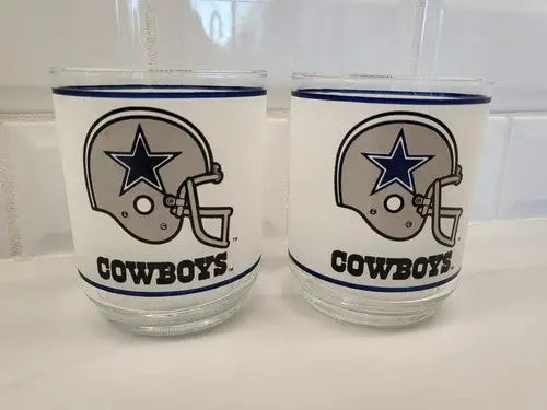 Two Dallas Cowboys frosted glass helmet logo drinking glasses for NFL fans