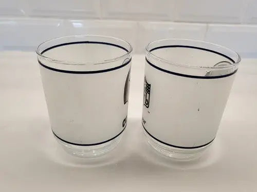 Dallas Cowboys frosted glass helmet drinking glasses with black trim for NFL fans