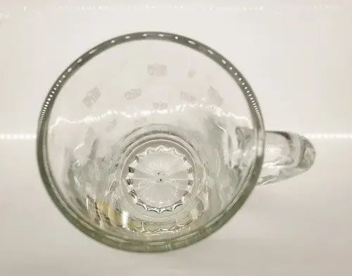 Empty glass beer mug featuring NFL 2008 Pittsburgh Steelers Superbowl XLIII Championship design