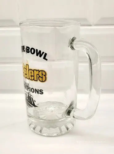 Glass beer mug with Steelers logo commemorating Superbowl XLIII Championship and Pittsburgh Steelers
