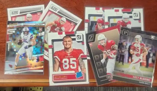 Collection of NFL Arizona Cardinals Trey McBride card rookie lot featuring 8 cards
