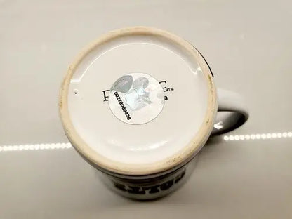 Bottom of Baltimore Colts coffee mug with sticker from Boelter Brands