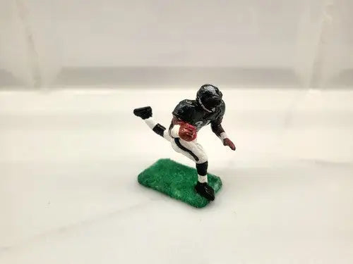 Football player figurine of Wilbert Montgomery in Philadelphia Eagles NFL custom figure
