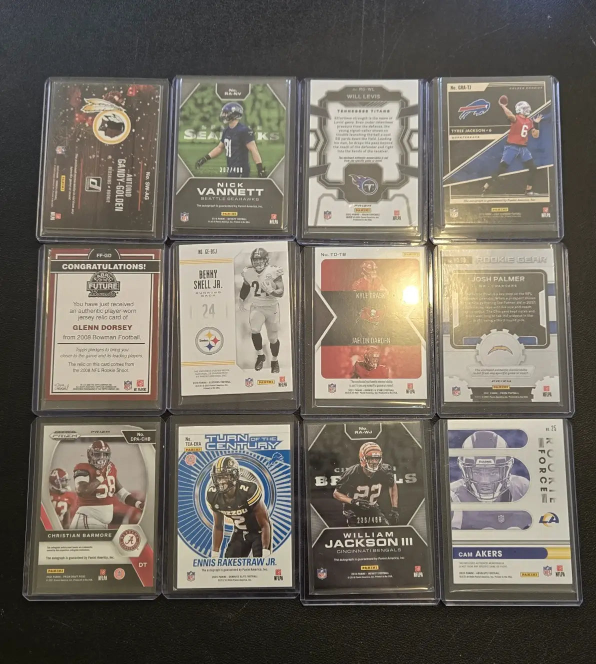 NFL football 12 card lot with rookie auto jersey relics and rookies jersey relics