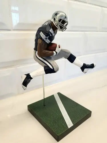 Dallas Cowboys loose action figure of Ezekiel Elliott, collectible NFL McFarlane toy