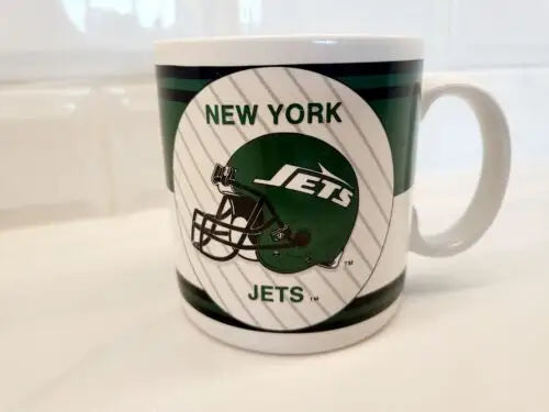 New York Jets Green and White ceramic coffee mug featuring logo design