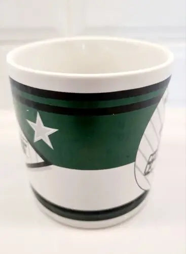 Green and white ceramic coffee mug featuring York Jets logo and design Mint!
