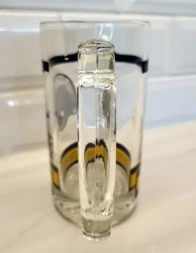 Clear glass beer stein with San Diego Chargers logo, perfect for fans and collectors