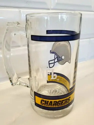 NFL San Diego Chargers beer stein featuring thumbprint logo design in clear glass