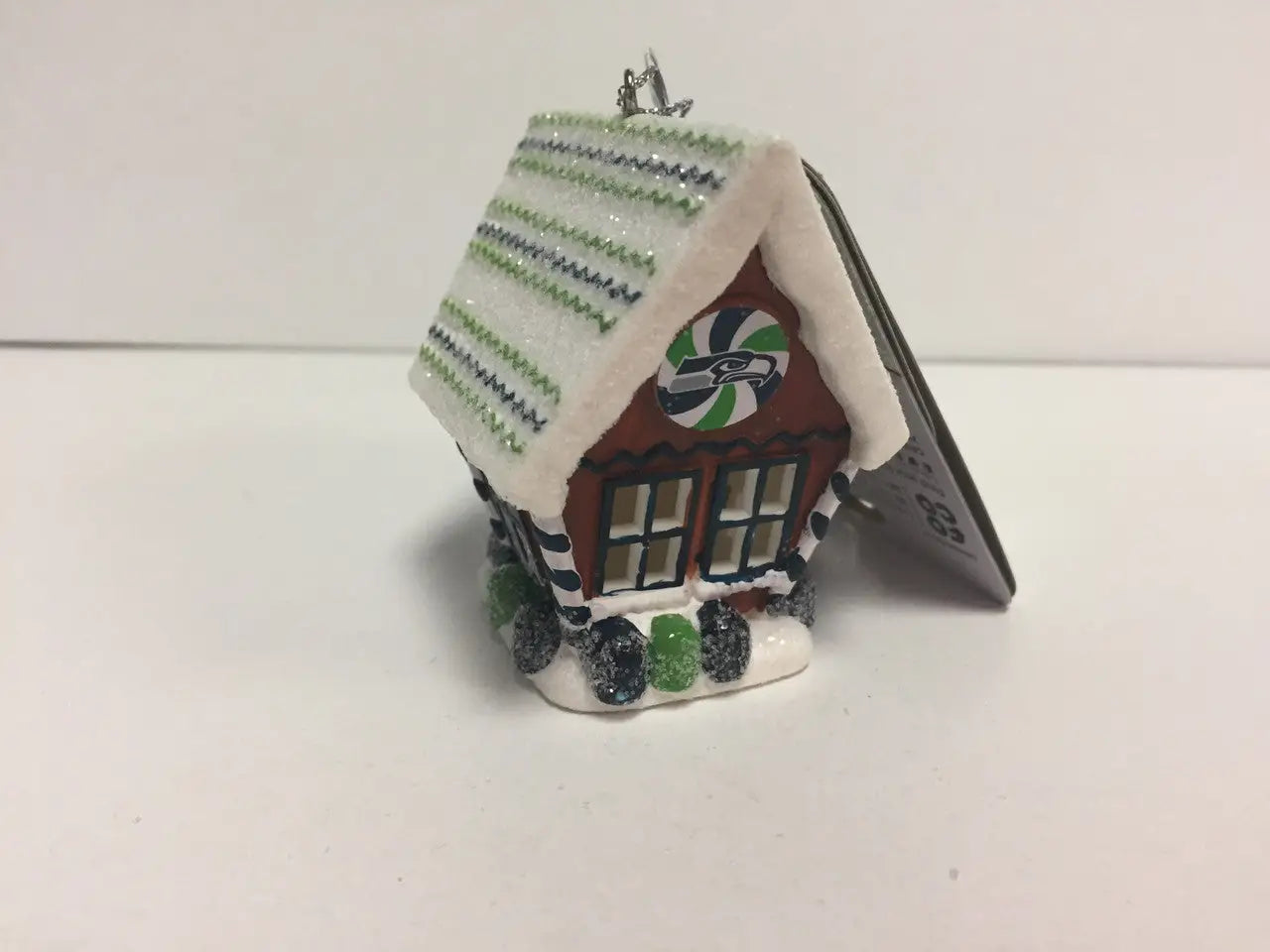 Miniature Christmas gingerbread house ornament with snow and candy for NFL Team Gingerbread House