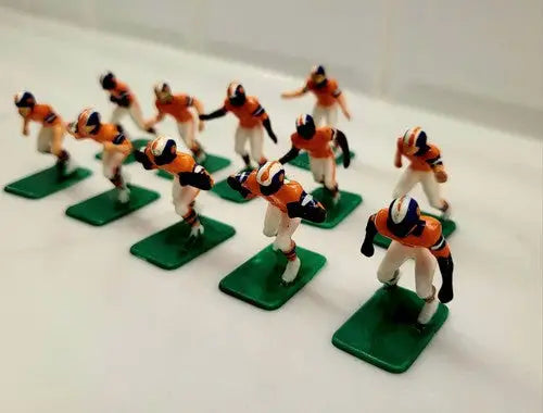Miniature Denver Broncos electronic football player figurines from NFL Vintage Tudor 11 set