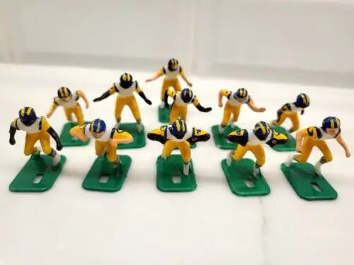 Miniature football players in NFL Vintage Tudor 11 Los Angeles Rams Electronic Football Set