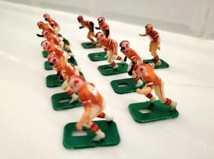 Vintage toy football players for NFL Buccaneers electronic football game display