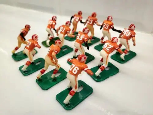 Vintage electric football figures of Tampa Bay Buccaneers electronic football players