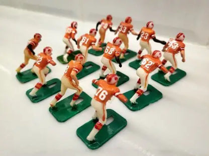 Vintage electric football figures of Tampa Bay Buccaneers electronic football players