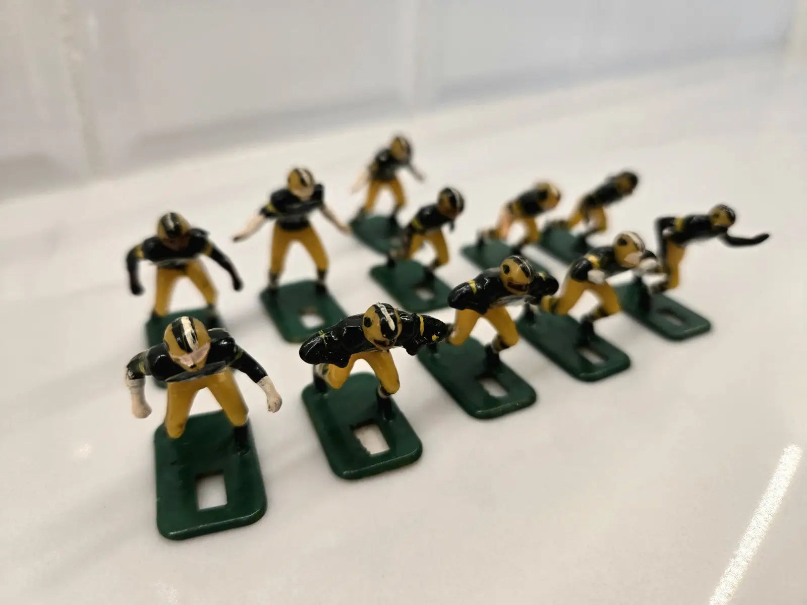 Miniature football figures from NFL Vintage Tudor in Green Bay Packers design