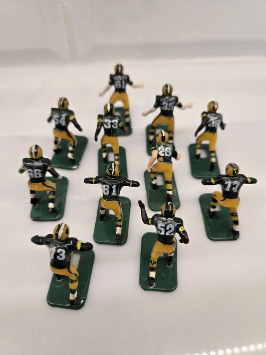 Vintage football figurines of Green Bay Packers players in NFL Tudor electronic toy