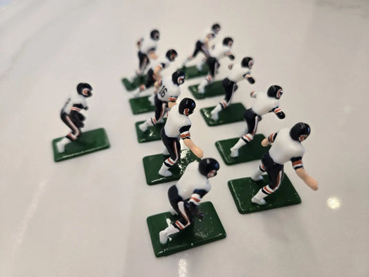 Vintage electronic football players set featuring Chicago Bears Tudor 11 from 1970s