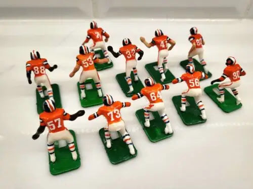 Miniature Denver Broncos electronic football player figurines from the 1970s Tudor set