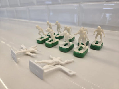 Miniature football figures from NFL Vintage 1970s Tudor electronic football set