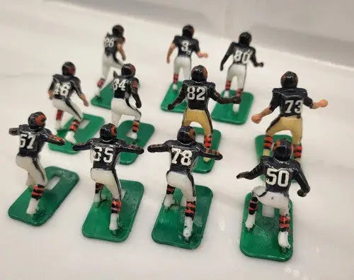 Miniature Chicago Bears electronic football players on green bases from NFL Vtg Haiti Tudor