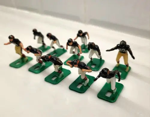Miniature football figurines from the NFL Vtg Haiti Tudor Chicago Bears Electronic set
