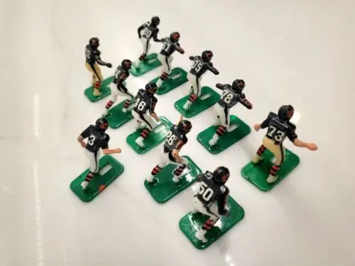 NFL Vtg Haiti Tudor 11 Chicago Bears Electronic Football Player Set displayed together