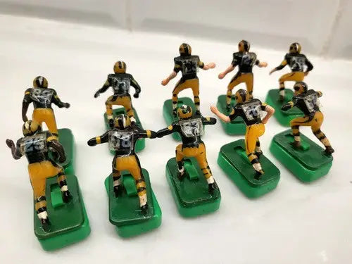 Vintage NFL Tudor Green Bay Packers electric football figures with custom stands