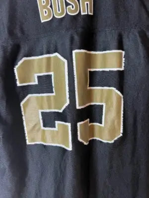 Black NFLPlayers sports jersey with gold and white number 25 size large Football Saints