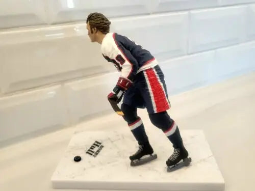 Hockey player figurine of Bobby Hull in Blue Uniform for NHL Winnipeg Jets collection