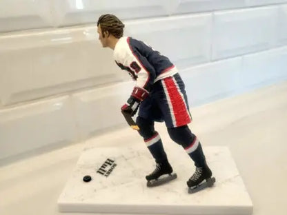 Hockey player figurine of Bobby Hull in Blue Uniform for NHL Winnipeg Jets collection