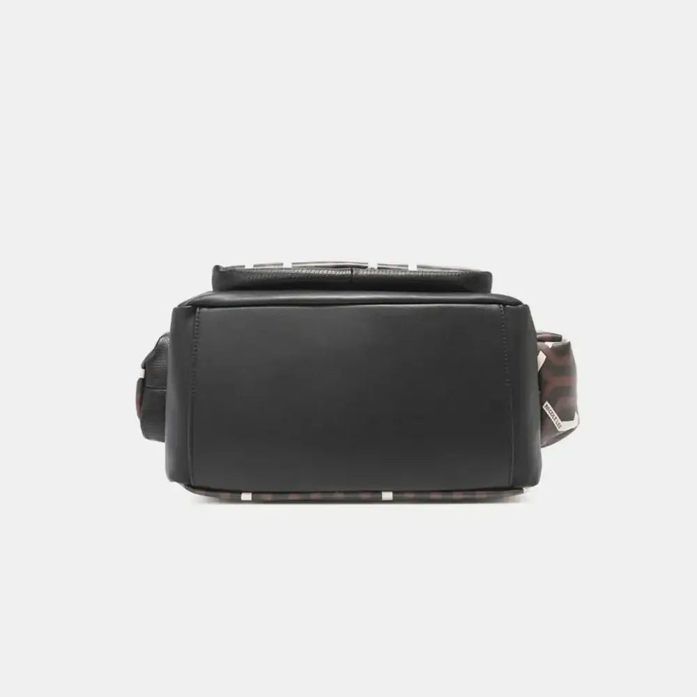 Nicole Lee vegan leather crossbody bag with silver hardware and zip compartments